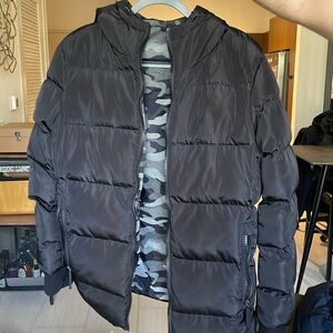 Super dry reversible black and camo puffer